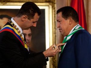 الاسد والرئيس الفنزويلي هوغو شافيز