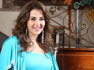 A glowing pregnant Donia has released another song from her album "A Whole New Woman." (Image: Facebook)
