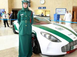 Luxury watch: Lt Mariam Al Ka’abi with the Aston Martin (Photo: xpress/ Zarina Fernandes)