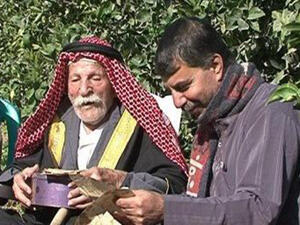 Omar Rajab Mohammad Toum says the secret of living 125 years is his diet. He mainly eats olive oil and thyme for breakfast and rabbit meat every day for lunch (Courtesy of Al-Arabiya)