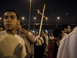 Coptic Christians protest outside the Cairo Coptic Hospital the day after 25 Coptic Christians were killed by the army. (Photo: Ed Giles)