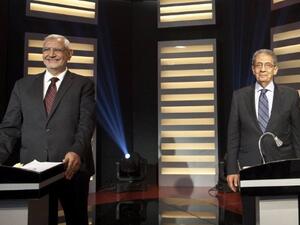 Presidential candidate and former Arab League Secretary General Amr Mussa (R) and moderate Islamist candidate, Abdelmoneim Abul Fotouh, during a live debate in Cairo. Presidential candidate and former Arab League Secretary General Amr Mussa (R) and moderate Islamist candidate, Abdelmoneim Abul Fotouh, during a live debate in Cairo.