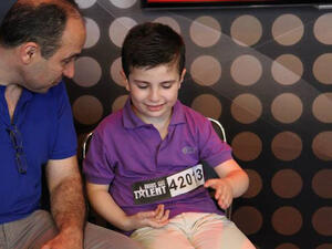 Eight-year-old Nael Traboulsi made it through his house being bombed in Syria to the AGT stage (Image: Facebook)