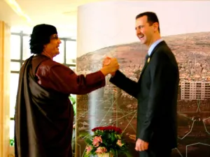 Gaddafi and Assad: an 'unholy' alliance of leaders tottering on brink of abyss of ousting.