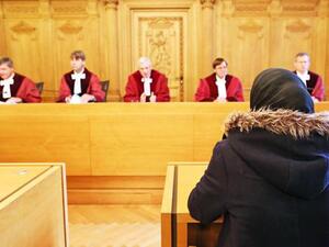School pupil Asma sits in the court room of the Administrative Court of Germany in Leipzig on Wednesday. (AFP)