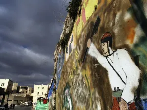 Israeli graffiti with messages as pointed as 'kill All Arabs' can be found by Israelis behind a campaign to maintain acts
of hatred targeting Palestinians. "The King’s Doctrine," is a book written by an unknown settler rabbi,  replete with justifications
from scripture for killing any innocent gentiles during religious war.