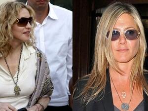 Madonna and Jen wearing their 'hand of fatima' necklaces. Image courtesy of Al Arabiya. 
