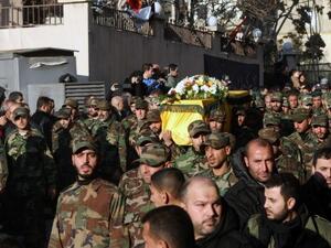 Hezbollah soldiers have been supporting regime fighters within Syria. One of Hezbollah's Lebanese commanders was recently killed in a battle near Damascus (AFP)