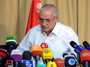 Tunisian mediator and Secretary General of the Tunisian General Labour Union (UGTT) Houcine Abbassi speaks during a press conference to announce the result of its latest bid to mediate an end to the crisis on September 21, 2013 in Tunis. (AFP)