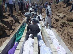 دفن ضحايا الحولة 
