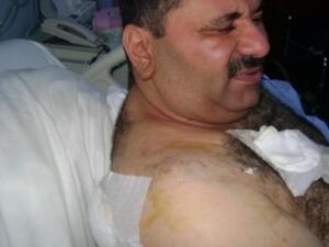 Husam al Abdallat speaking from his hospital bed. 