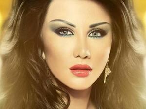 Syrian beauty and starlet Jenny Asper shows she is not anti-American at all. (image courtesy of anazahra.com)