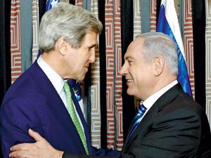 وزير الخارجية الاميركي جون كيري خلال لقائه مع رئيس الوزراء الاسرائيلي بنيامين نتانياهو  في القدس في 23 اذار/مارس