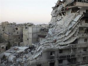 منظر عام لمبان مدمرة في حي الخالدية بحمص