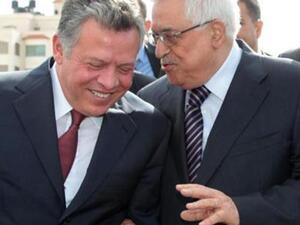 العاهل الاردني الملك عبد الله والرئيس الفلسطيني محمود عباس في الضفة الغربية يوم الخميس
