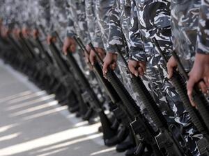 Soldiers serving as bodyguards get valuable experience running errands for politicians ... (Al Akhbar / Haitham Moussawi)