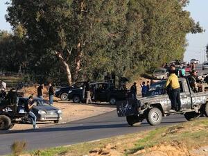 Libyan rebel groups have established checkpoints nationwide as they compete for power and territory control with other militias as well as the central government (Mahmud Turkia/AFP)