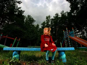 Playground play- otherwise assumed to be innocent and harmonious- is often a stressful time for children who experience
 bullying or segregation or discrimination.  This can be drawn from applied behaviors from the home and parents.