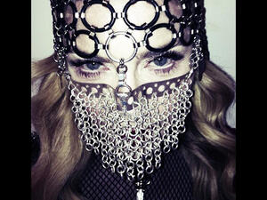 What could this mean? Madonna in chain-mail Muslim niqab. (Image: Facebook)
