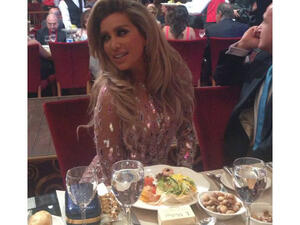 Maya Diab loves to pose even at dinner time! (Image: Facebook)