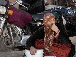 امراة سورية في مدينة الرقة
