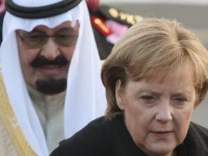العاهل السعودي والمستشارة الالمانية انجيلا ميركل خلال زياتها الرياض الاسبوع الماضي