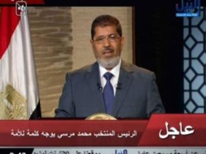 مرسي خلال القائه الخطاب