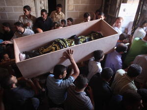 Palestinians burying their dead (image used for illustrative purposes)