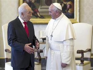 Israeli President Simon Peres met with Pope Francis at the Vatican earlier this year, but Israel's PM Netanyahu will forgo doing the same this week (Reuters)