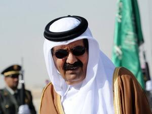 The emir of Qatar called on more economic support for 'Arab Spring' economies at the opening of the Arab league summit 