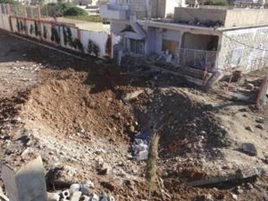 منازل مدمرة جراء قصف الطائرات السورية لرأس العين
