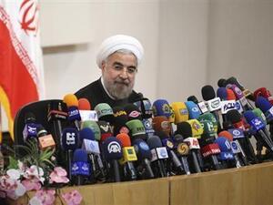 During a press conference Sunday regarding the historic deal between Iran and world powers on the latter's nuclear program, Iranian president Hassan Rouhani reiterated to reporters that his country would "never" seek atomic weapons (File Archive/AFP)
