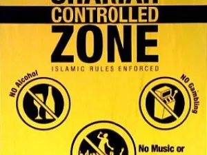 Zoning: a way to have religious law circumscribed to a region of an otherwise non-practicing nation under state rule. The posters warn passers that they are entering a zone under Islamic rules, such as 'no alcohol' or 'no porn or prostitution'.

