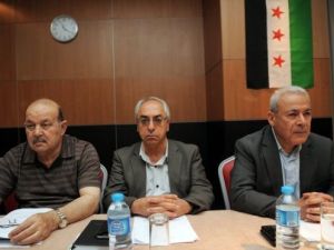 عبد الباسط سيدا والى يساره برهان غليون