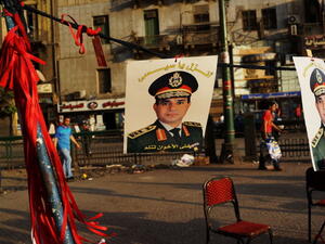 A picture of Egyptian military chief Abdel Fattah al-Sisi hangs in Tahrir Square. (Getty file photo)