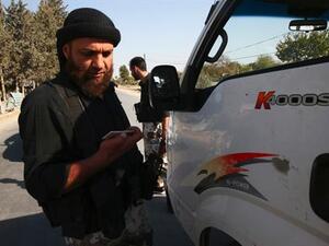 The suicide bombers reportedly detonated at a checkpoint manned by regime forces in Qara (Bassam Khabieh/Reuters)