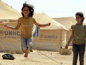 Syrian refugee children play at the Zaatari refugee camp close to the Jordanian city Mafraq, near the border with Syria