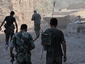 The opposition fighters were attempting to flee into nearby Lebanon, AFP reported. (AFP)