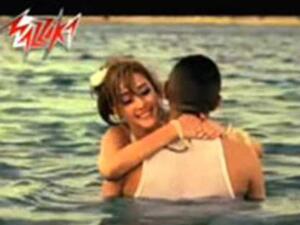 Tamer Hosny in a clinch with Basma Boussil