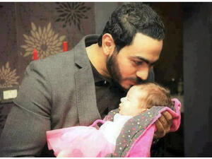 Image of Tamer with his daughter courtesy of www.alonota.com