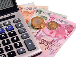 Turkey's central bank, statutorily independent, is trying to prop up the lira by selling dollars from its reserves.
 Turkey's central bank, statutorily independent, is trying to prop up the lira by selling dollars from its reserves.