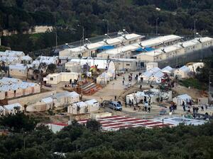 A picture shows a view of the Moria camp for migrants and refugees on the Greek island of Lesbos on March 20, 2016. (AFP/Stringer)