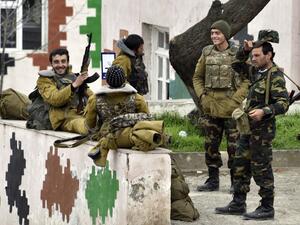 Soldiers of the defense army of Nagorno Karabakh gather in the village of Mataghis, some 70km north of Karabakh's capital Stepanakert, on April 6, 2016. (AFP/Karen Minasyan)