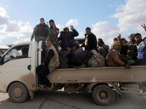 أفراد من قوات سوريا الديمقراطية في دير الزور
