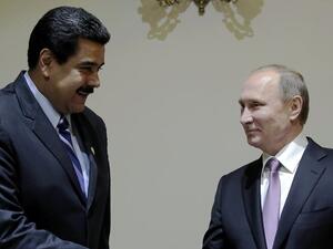 الرئيسان الروسي فلاديمير بوتين والفنزويلي نيكولاس مادورو