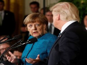 الرئيس الأمريكي دونالد ترامب والمستشارة الألمانية أنغيلا ميكل 