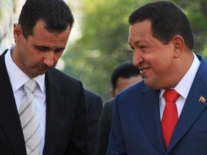 شافيز يستقبل الاسد