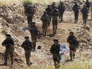 جنود اسرائيليون خلال دورية على الحدود مع سوريا