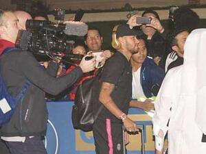 PSG’s Brazilian superstar Neymar poses for a selfie with fans in Doha yesterday. (Photo: Noushad Thekkayil)