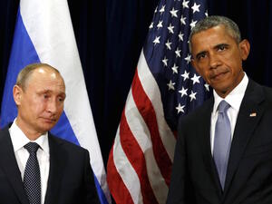 Barack Obama called for the removal of Syrian President Bashar al-Assad while Vladmir Putin said abandoning the current government would be a mistake. (AFP/File)